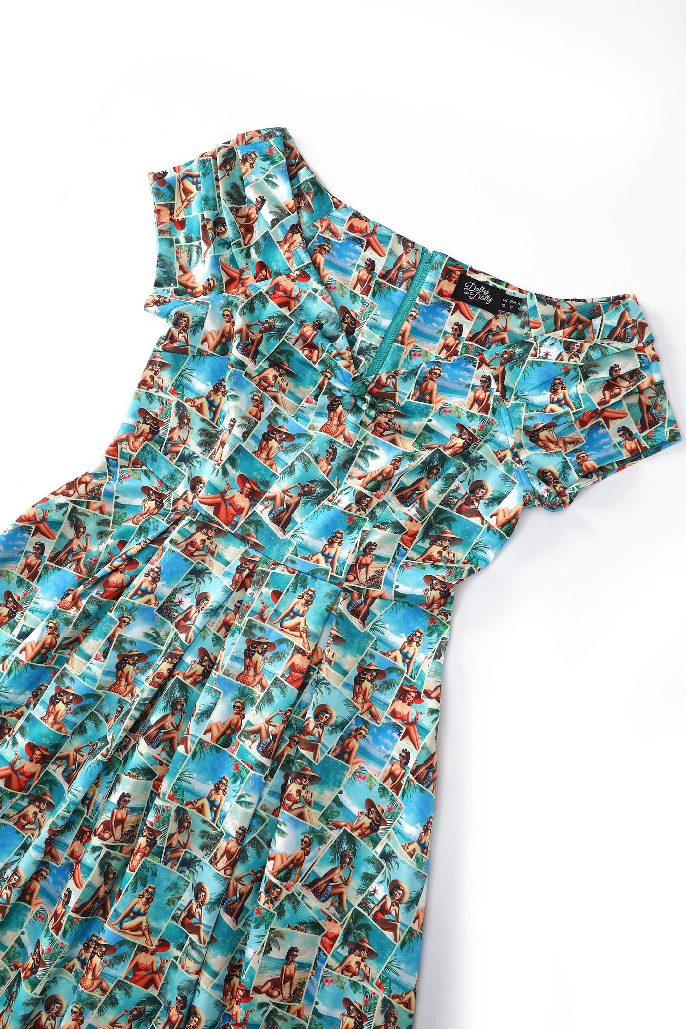 Close up view of Lily Pinup Postcard Off Shoulder Dress