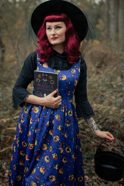 A lady wearing a Witch Print in Blue Sleeveless Swing Dress
