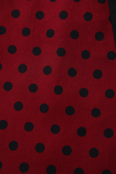 Close up view of Pleated Black Dress With Burgundy Polka Dots