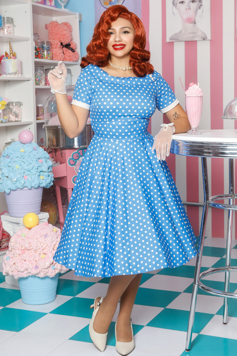 A model wearing a  Polka Dot Circle Dress In Sky Blue