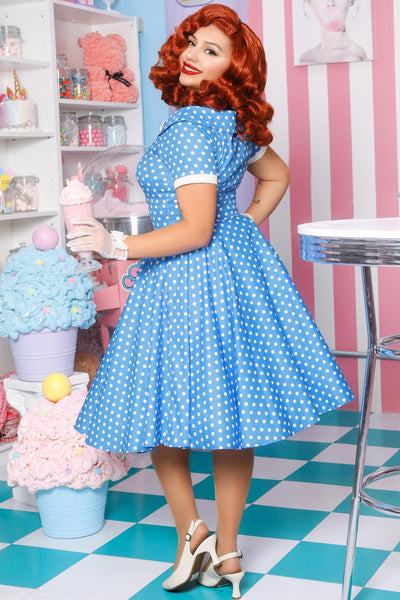 A model wearing a  Polka Dot Circle Dress In Sky Blue