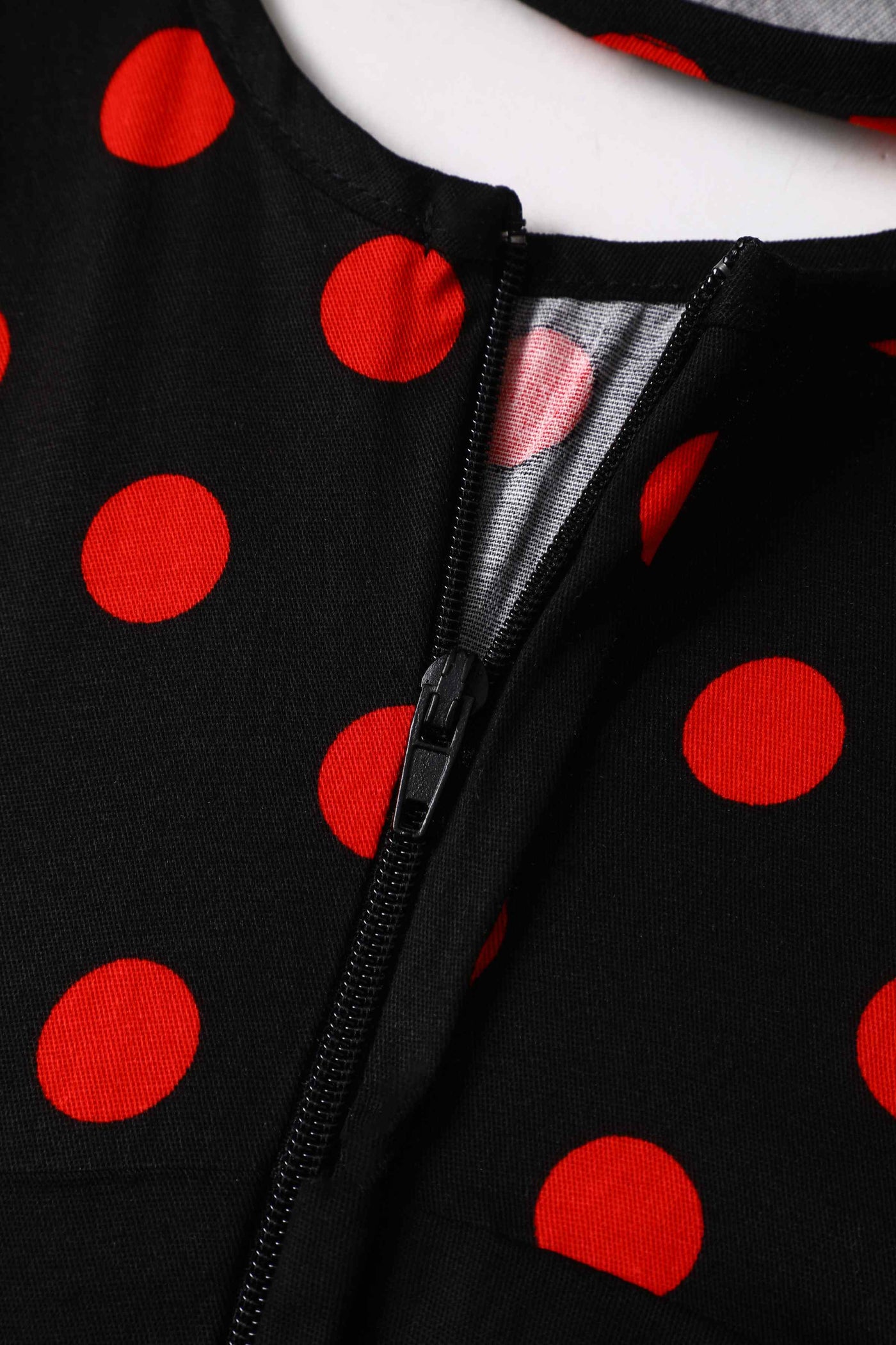 Close up view of Polka Dot Shirt Dress in Black and Red