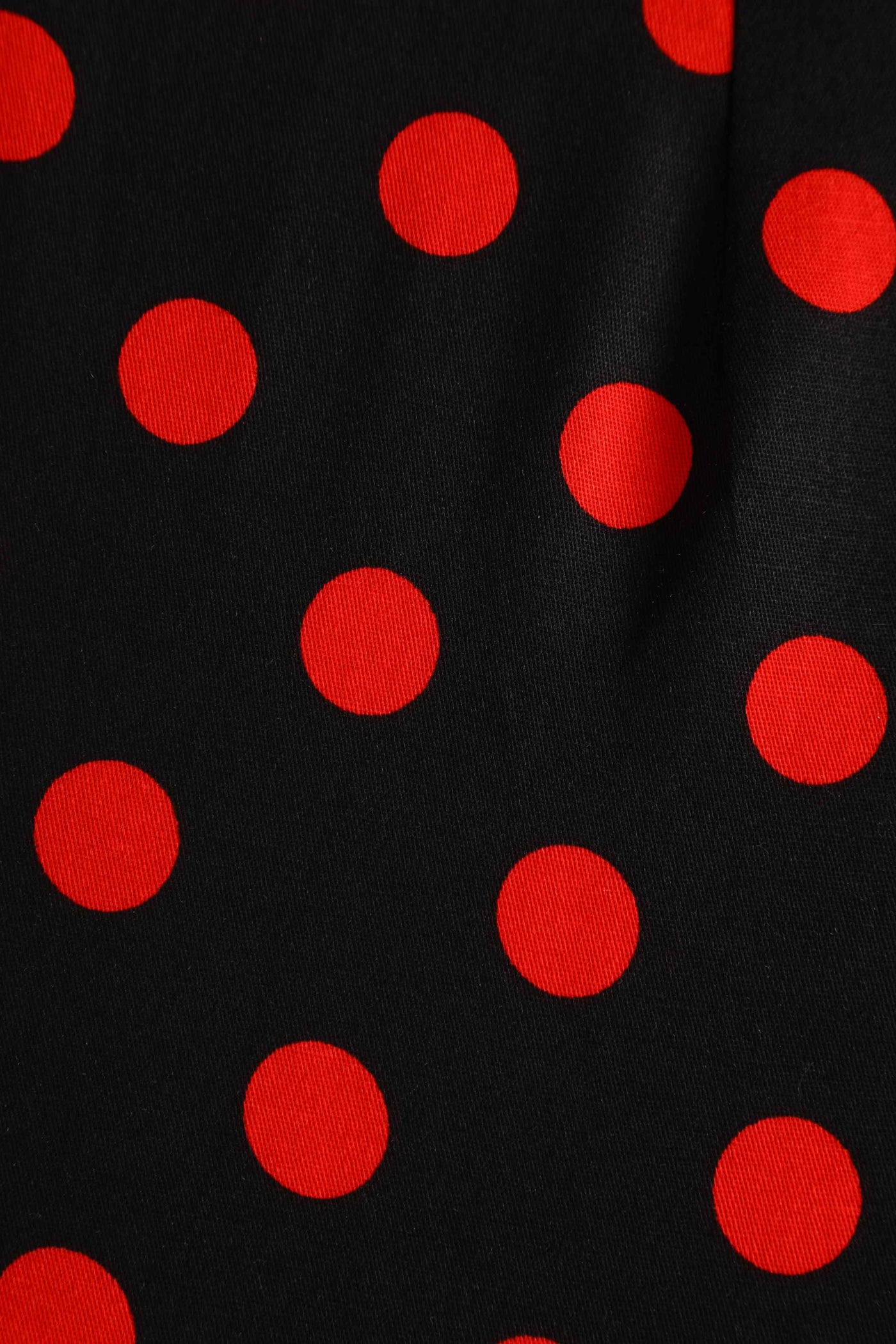Close up view of Polka Dot Shirt Dress in Black and Red
