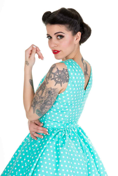 Close up view of Polka Dot Swing Dress in Aqua Blue