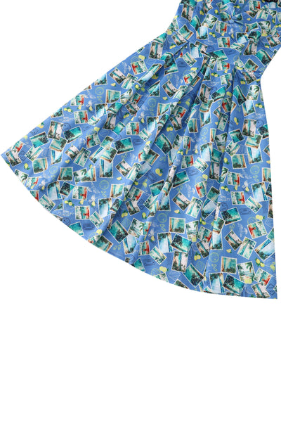 Close up view of Postage Stamp Off Shoulder Dress In Blue