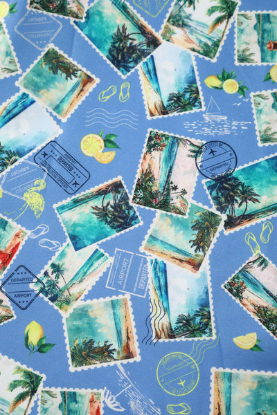Close up view of Postage Stamp Off Shoulder Dress In Blue