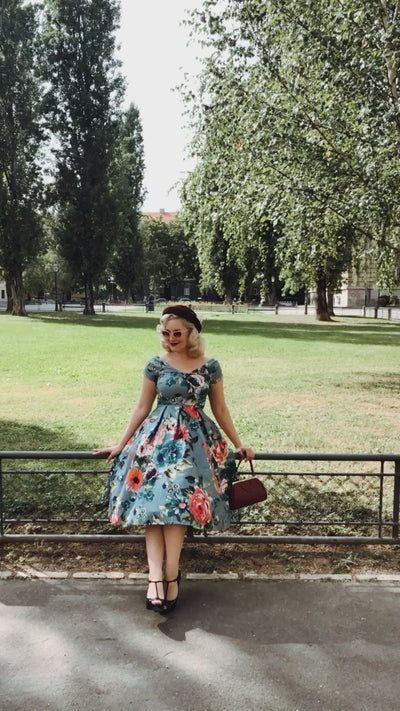 Model wearing Blue Floral Swing Dress