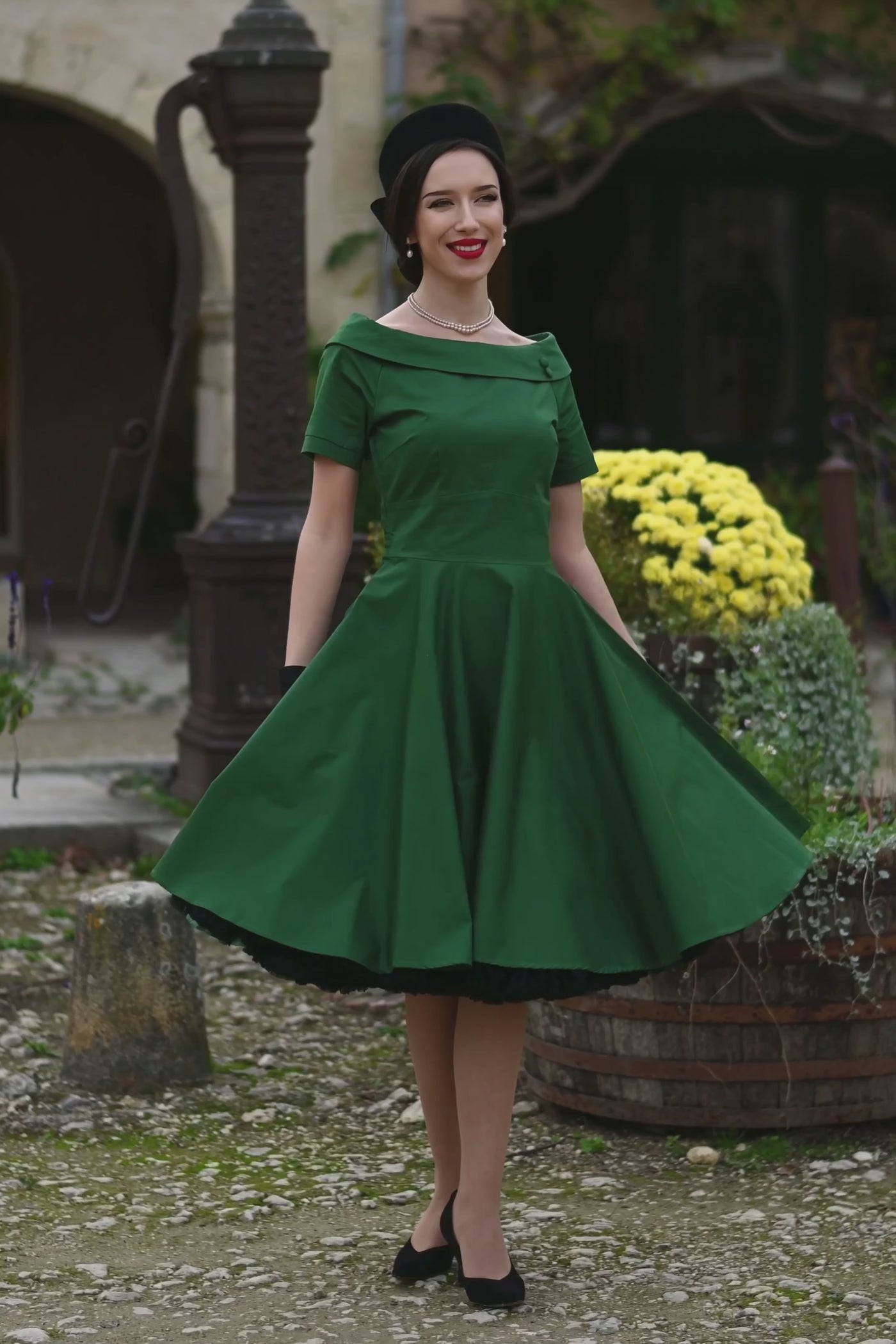 A mode wearing a Darlene Green Roll Collar Circle Dress