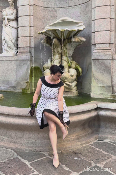 A video of Cindy White & Black Polka Dot Circle Dress