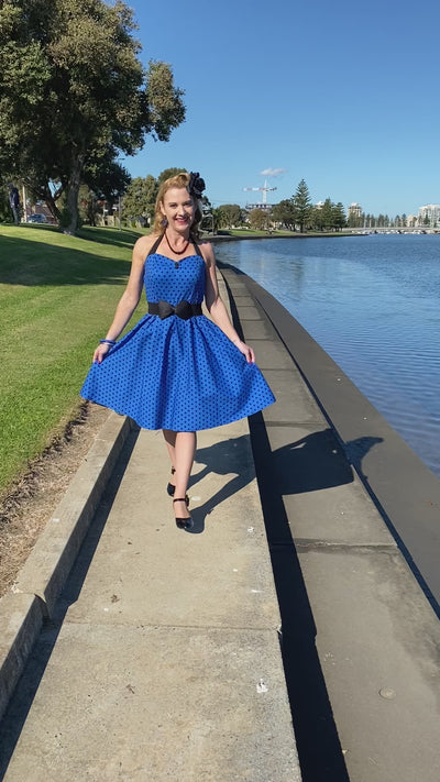 A video of Ms. kentuckyred wearing our Sophia Halter Neck Royal Blue Spot Dress.
