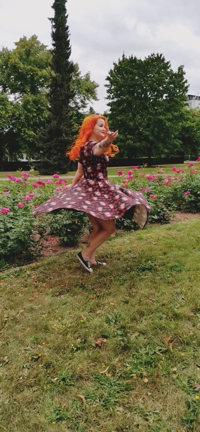 Video of Ms. rosaliewildcat rocking our Rockabilly Skulls & Roses Darlene Swing Dress