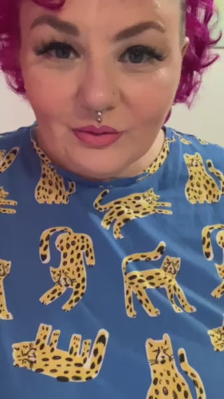 Video of our customer wearing and accessorising our purple long sleeved midi dress