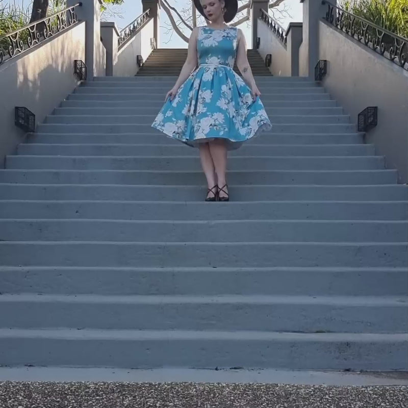 Video of miss_audrey_azure wearing our Annie Mint Floral Swing Dress