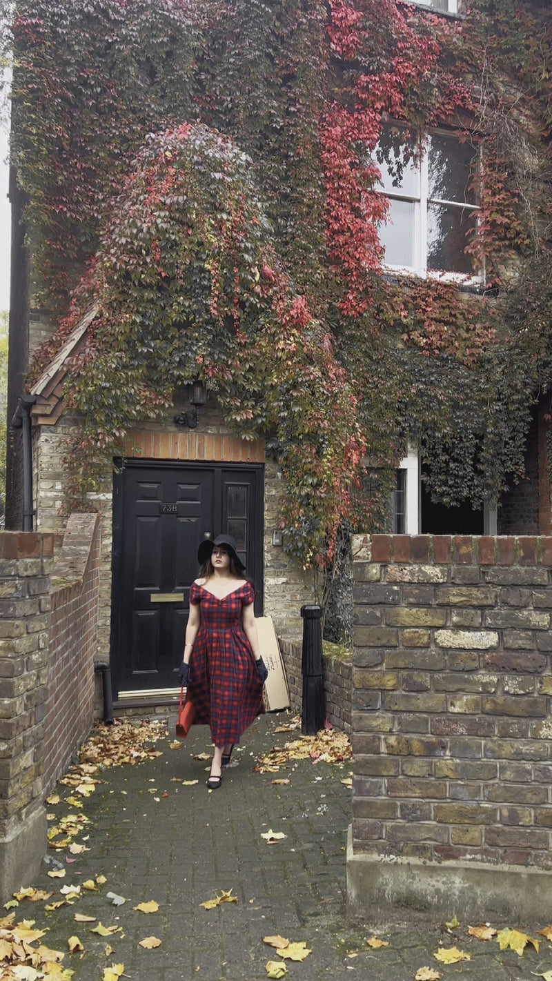 Video of a model wearing an Off-Shoulder, Red Tartan Swing Dress