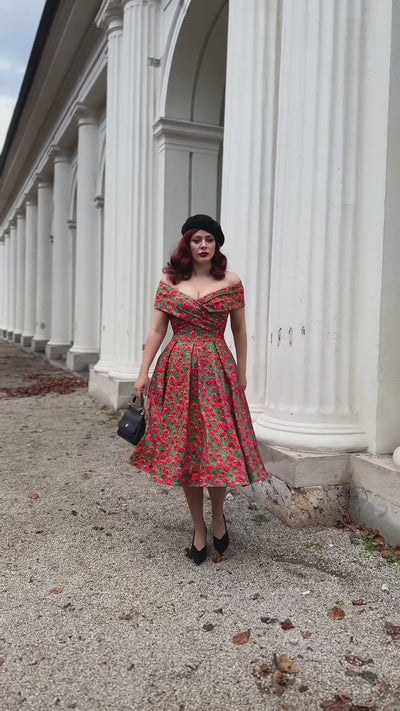 A model wearing a  Red Poppy Garden Off Shoulder Dress