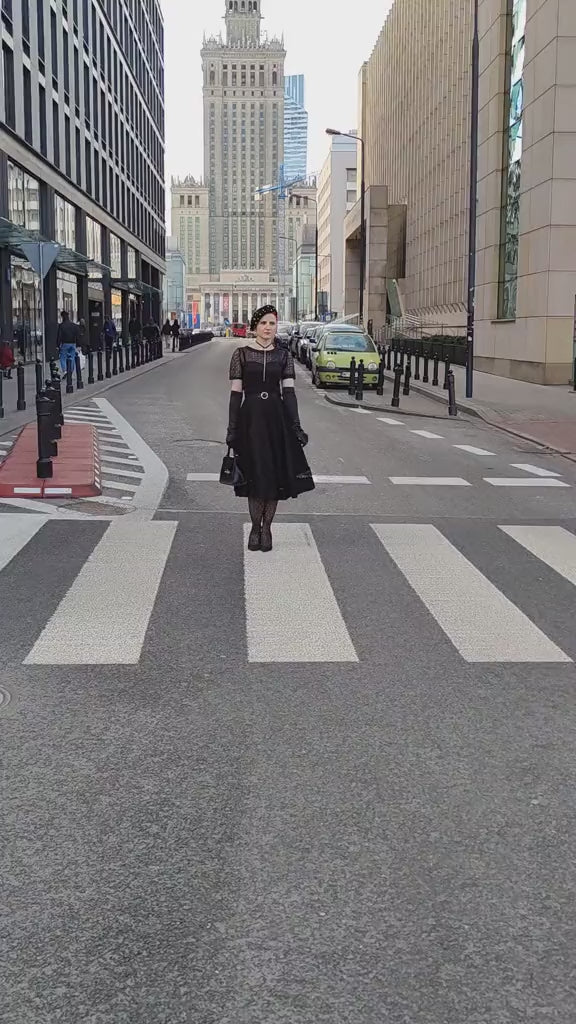 A video of MS. sippingrosetea wearing our Tess Sleeved Formal Lace Dress in Black .