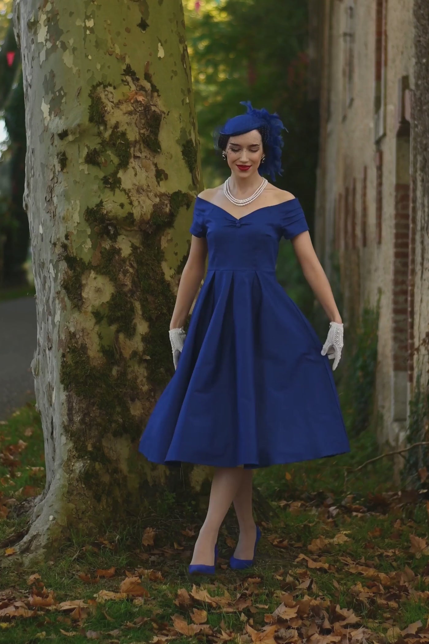 Video of A elegant model wearing a Lily Dark Blue Off Shoulder Dress