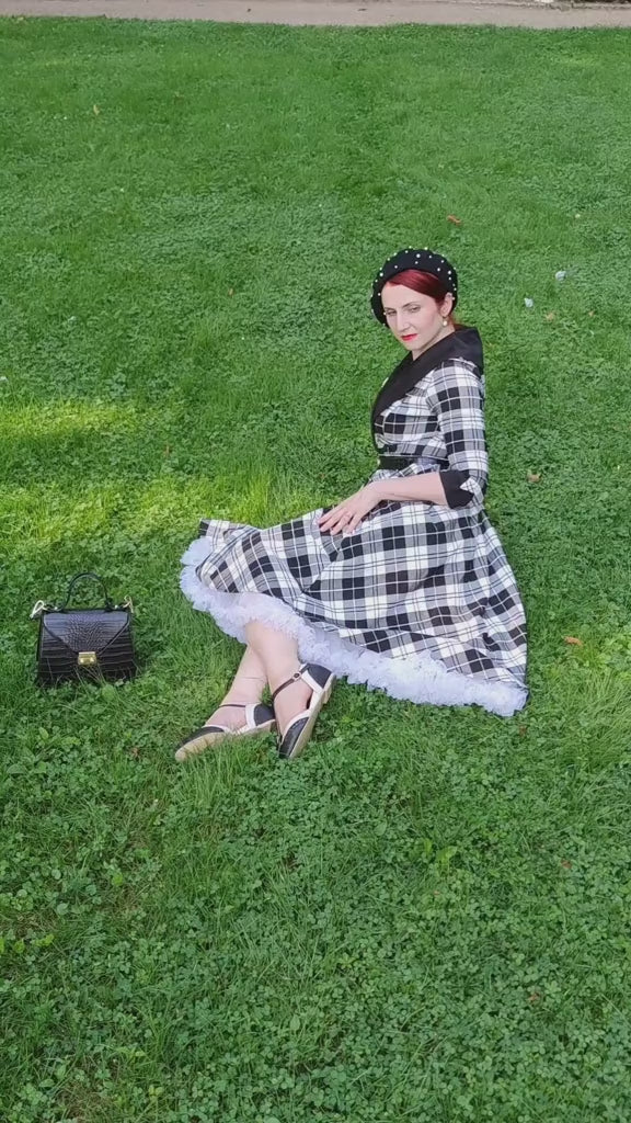 Video of Ms. sippingrosetea_ wearing our Tiffany 50's Black Tartan Coat Dress.