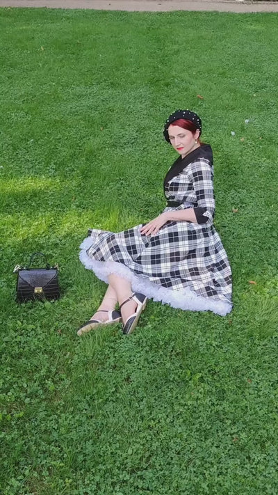 Video of Ms. sippingrosetea_ wearing our Tiffany 50's Black Tartan Coat Dress.