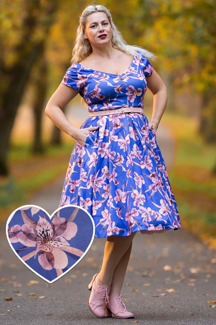 A lady wearing a Purple Alstroemeria Off Shoulder Dress