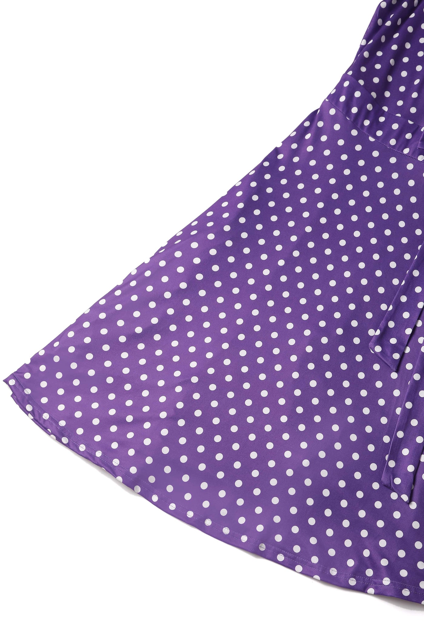 purple and white polka dot knit fabric