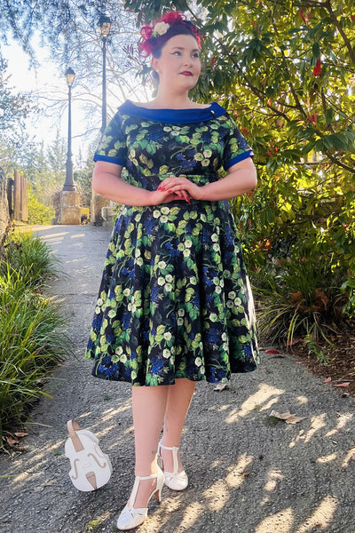 Customer wears our Darlene purple berry print swing dress