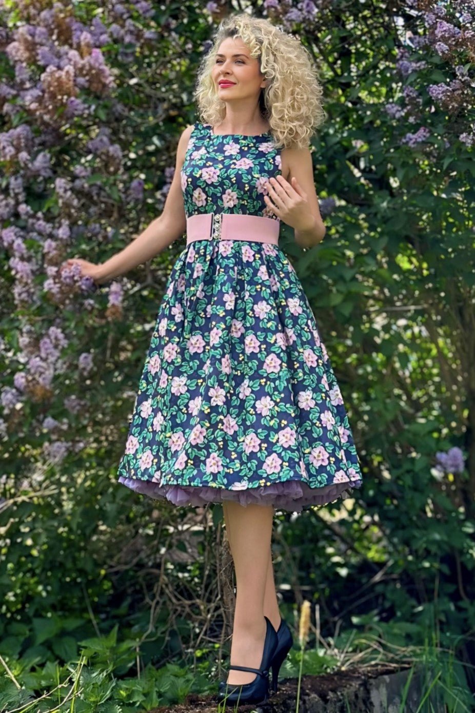 Model wearing a Purple Floral Swing Dress