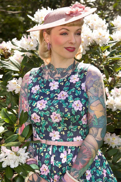 Model wearing a Purple Floral Swing Dress