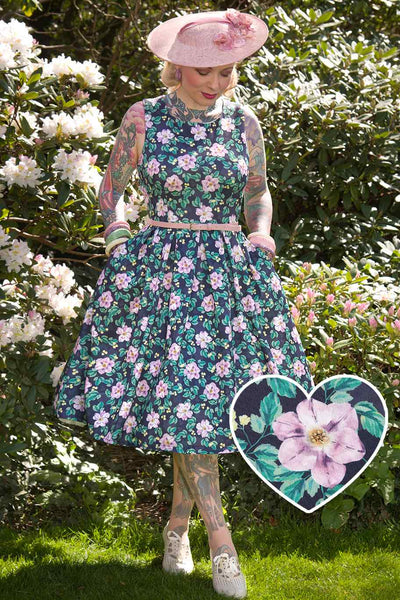 A model wearing a Purple Floral Swing Dress