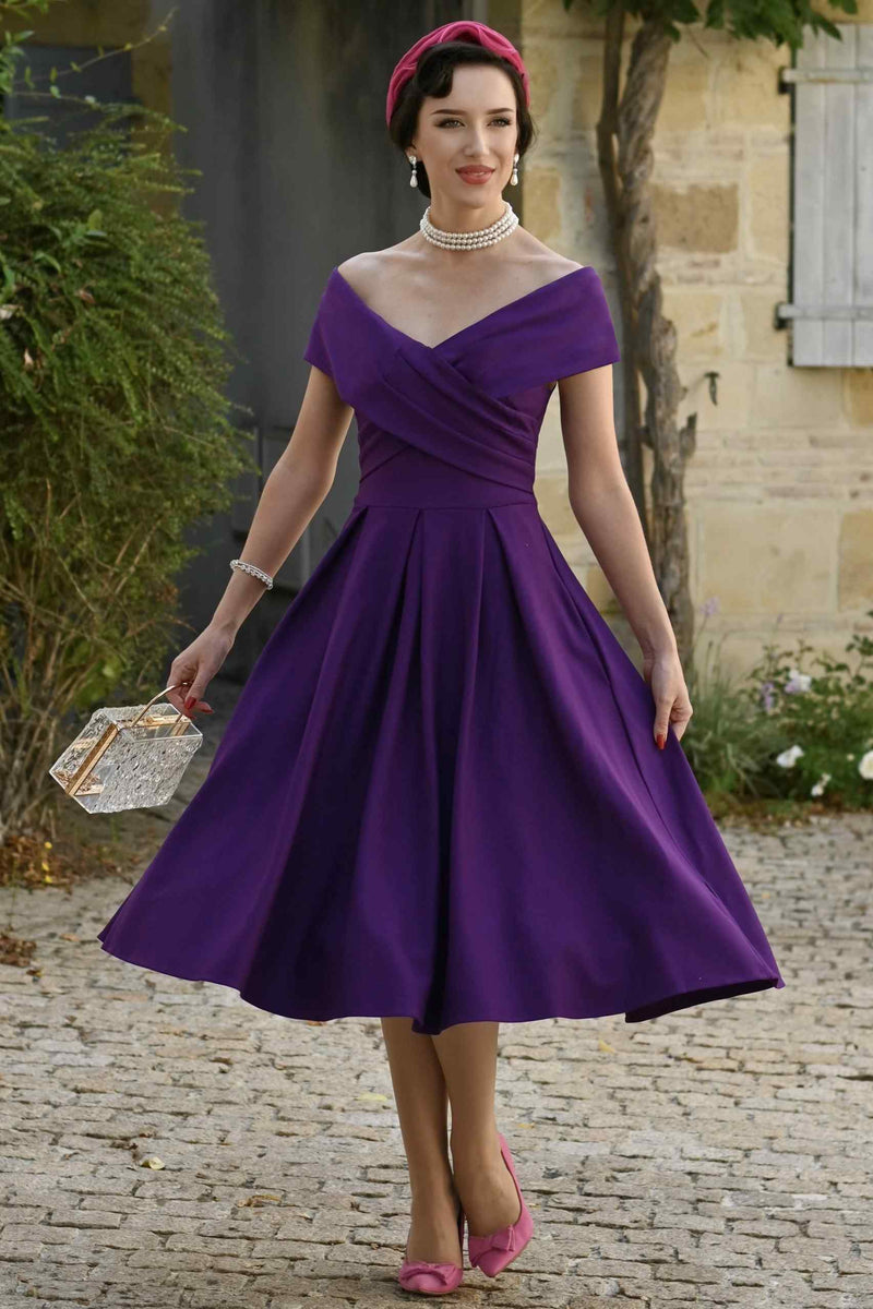 A model wearing a Purple Off Shoulder Dress