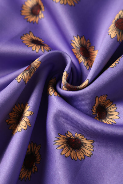 Close up view of Purple Off Shoulder Dress With Yellow Sunflowers