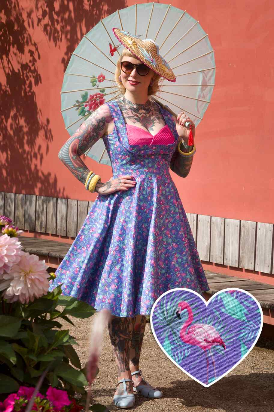 A model wearing Purple Pleated Dress in Flamingo Leaf Print
