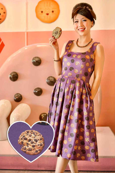 A model wearing Purple Retro Flared Dress in Cookie Print