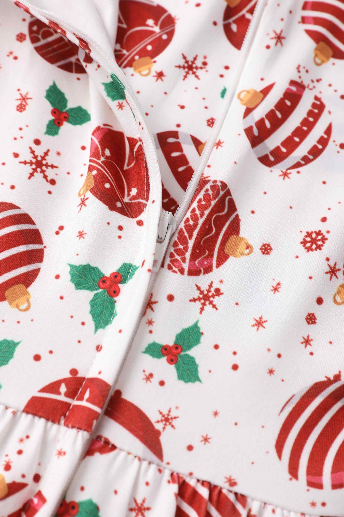 Close up view of Red Bauble Long Sleeved Dress