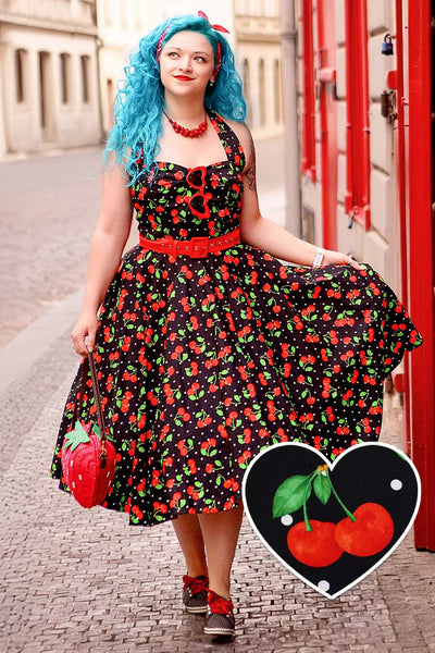 A model wearing a Daisy Red Cherry Halter Dress In Black
