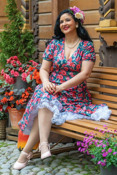 A model wearing Red Floral Midi Dress In Petrol Blue
