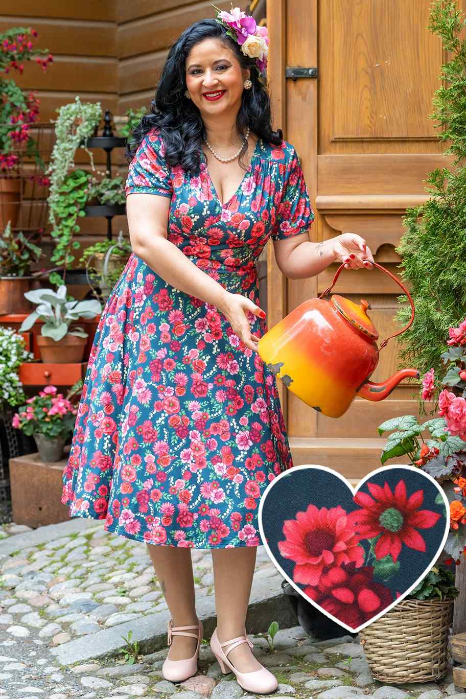 A model wearing Red Floral Midi Dress In Petrol Blue