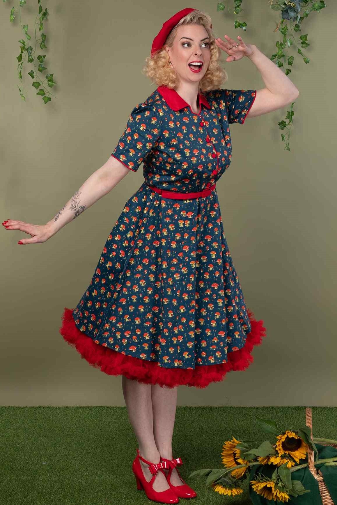 A model wearing a Red Mushroom Shirt Dress in Blue