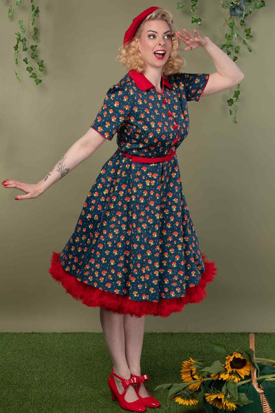 A model wearing a Red Mushroom Shirt Dress in Blue