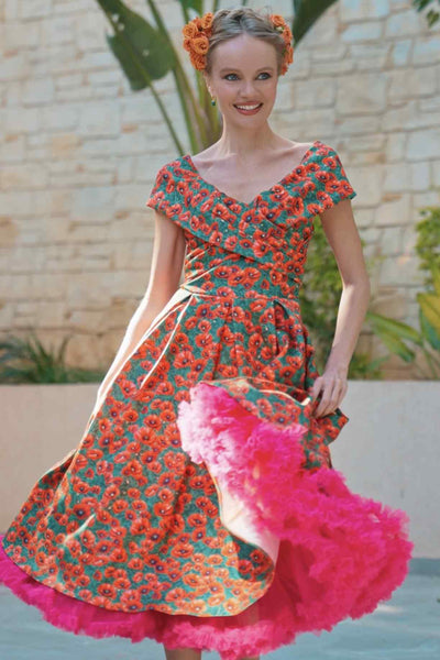 A lady wearing a Red Poppy Garden Off Shoulder Dress