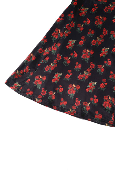 Close up View of Red Rose and Bird Cap Sleeved Swing Dress in black