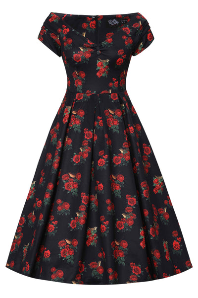 A lady wearing a Red Rose & Bird Off Shoulder Dress In Black