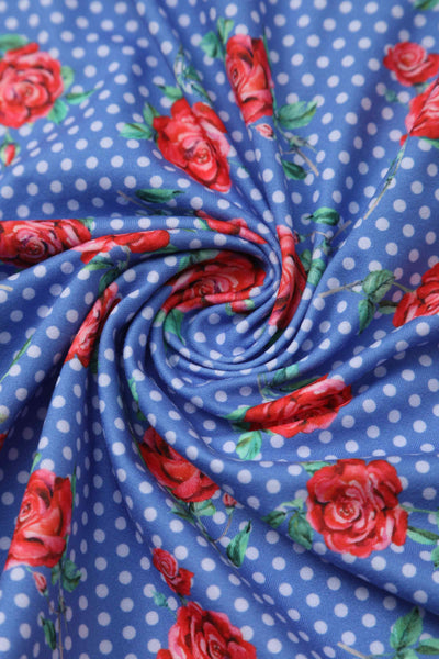 Close up view of Red Rose Wrap Dress In Blue