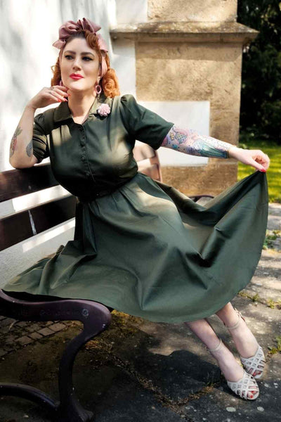 A lady wearing a  Retro Army Green Shirt Dress