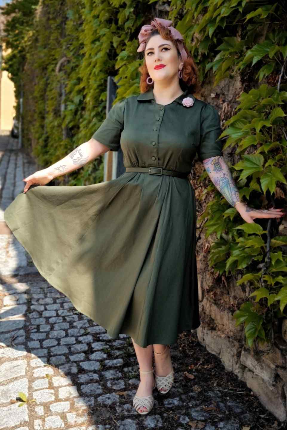 A lady wearing a  Retro Army Green Shirt Dress
