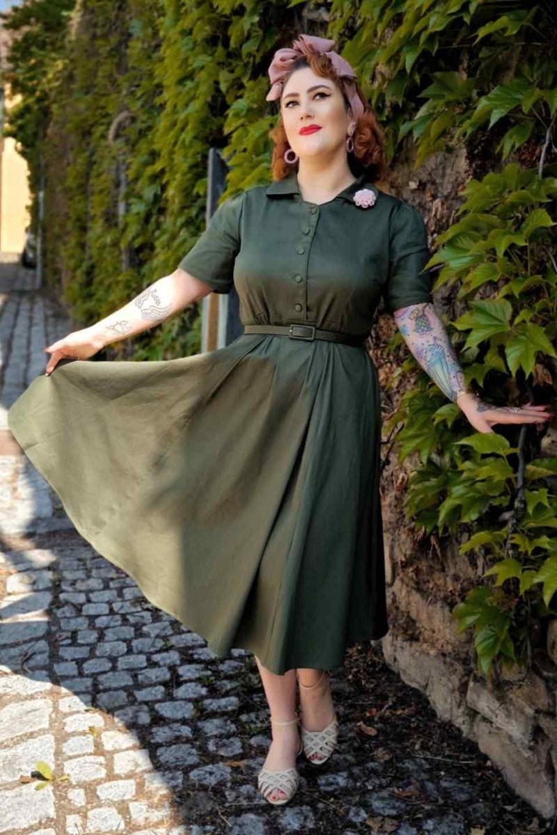 A lady wearing a  Retro Army Green Shirt Dress
