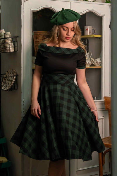 A model wearing Retro Black & Green Tartan Swing Dress