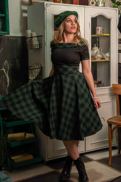 A model wearing Retro Black & Green Tartan Swing Dress