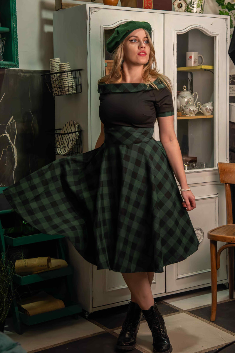 A model wearing Retro Black & Green Tartan Swing Dress