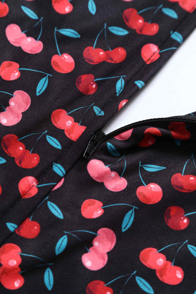 Close up View of Retro Cherry Print Crossover Bust Dress in Black